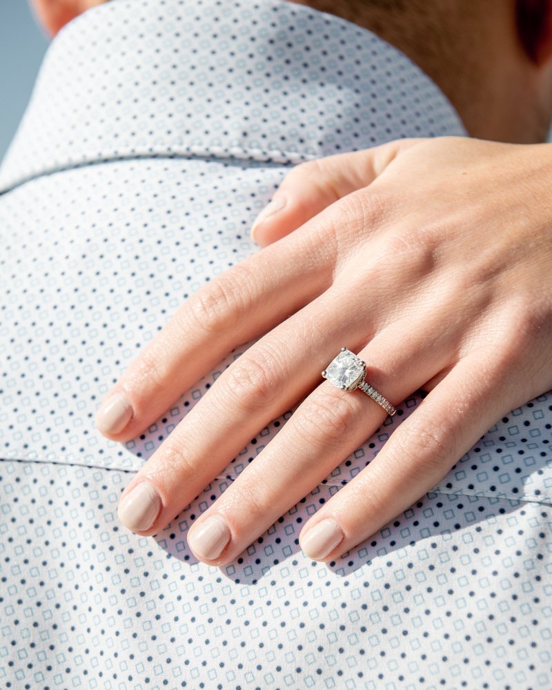 14k White gold diamond engagement ring on hand 