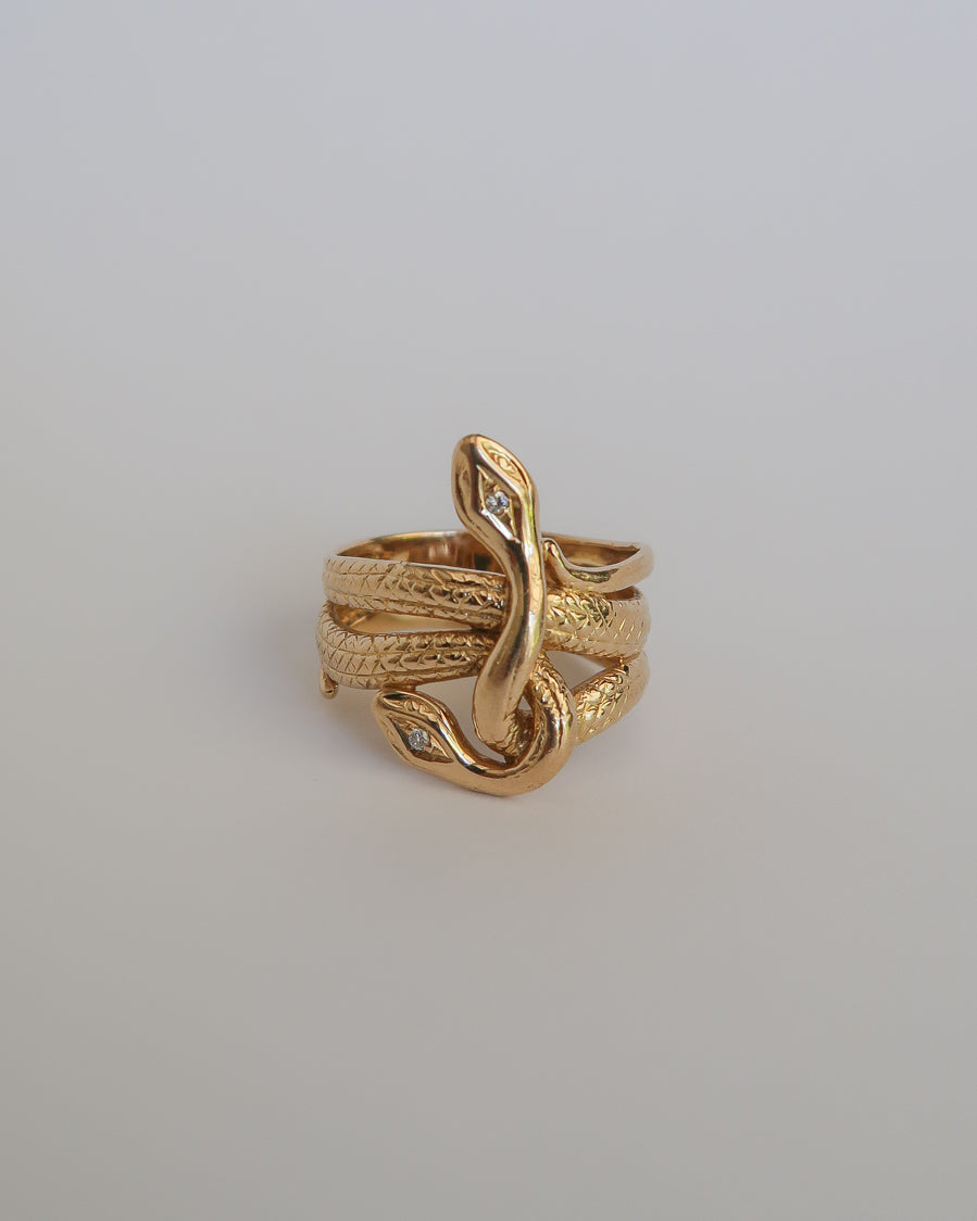 14k yellow gold double snake ring with diamond eyes. for sale 