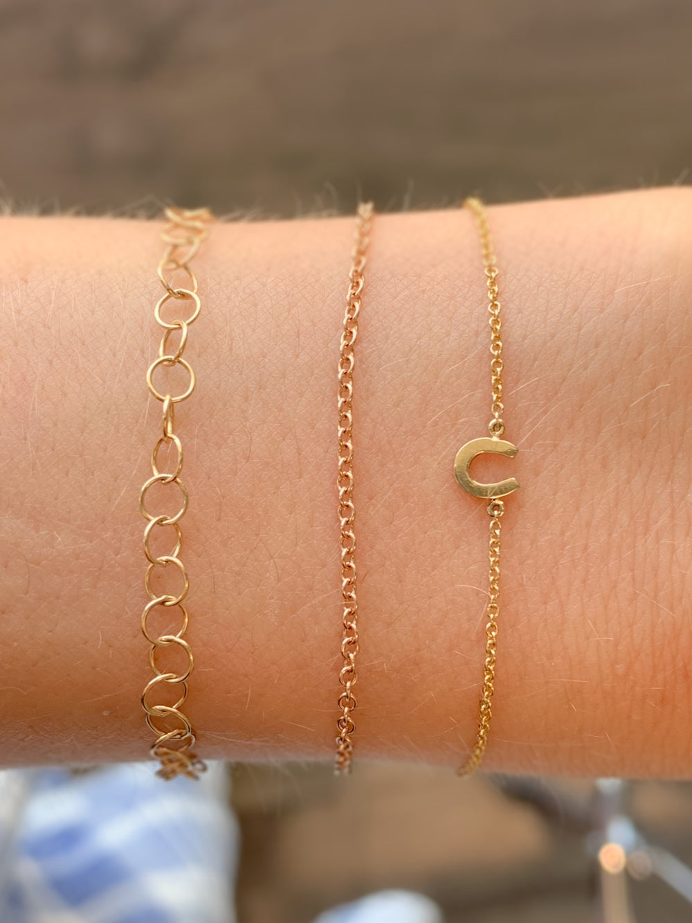 14k yellow gold bracelets with a gold horse shoe
